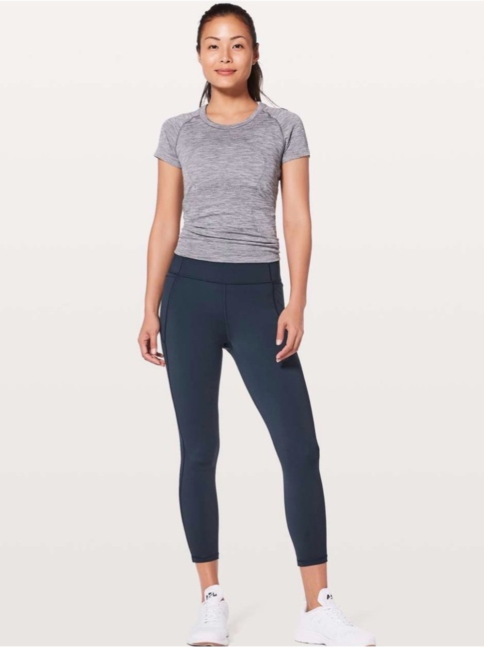 Lululemon In Movement crop leggings. Size 4. Color is blue.